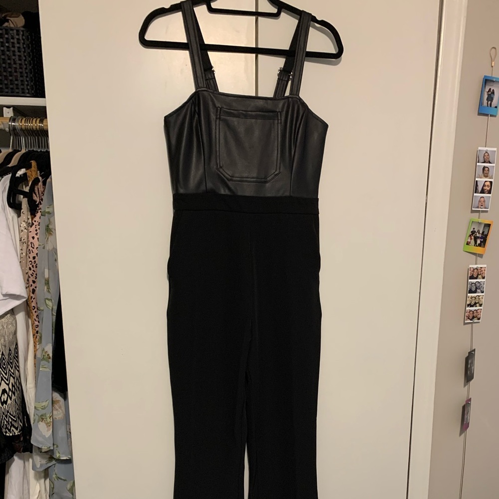 Black jumpsuit with leather upper